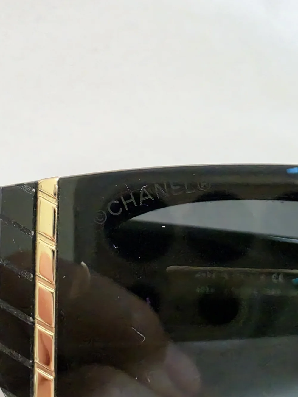 CHANEL Black Cat-Eye Sunglasses with Gold Trim